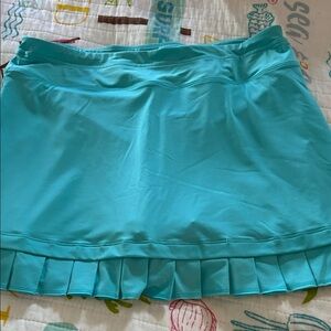 Fila Women's Aqua Pleated Mini Skirt. Preowned size small